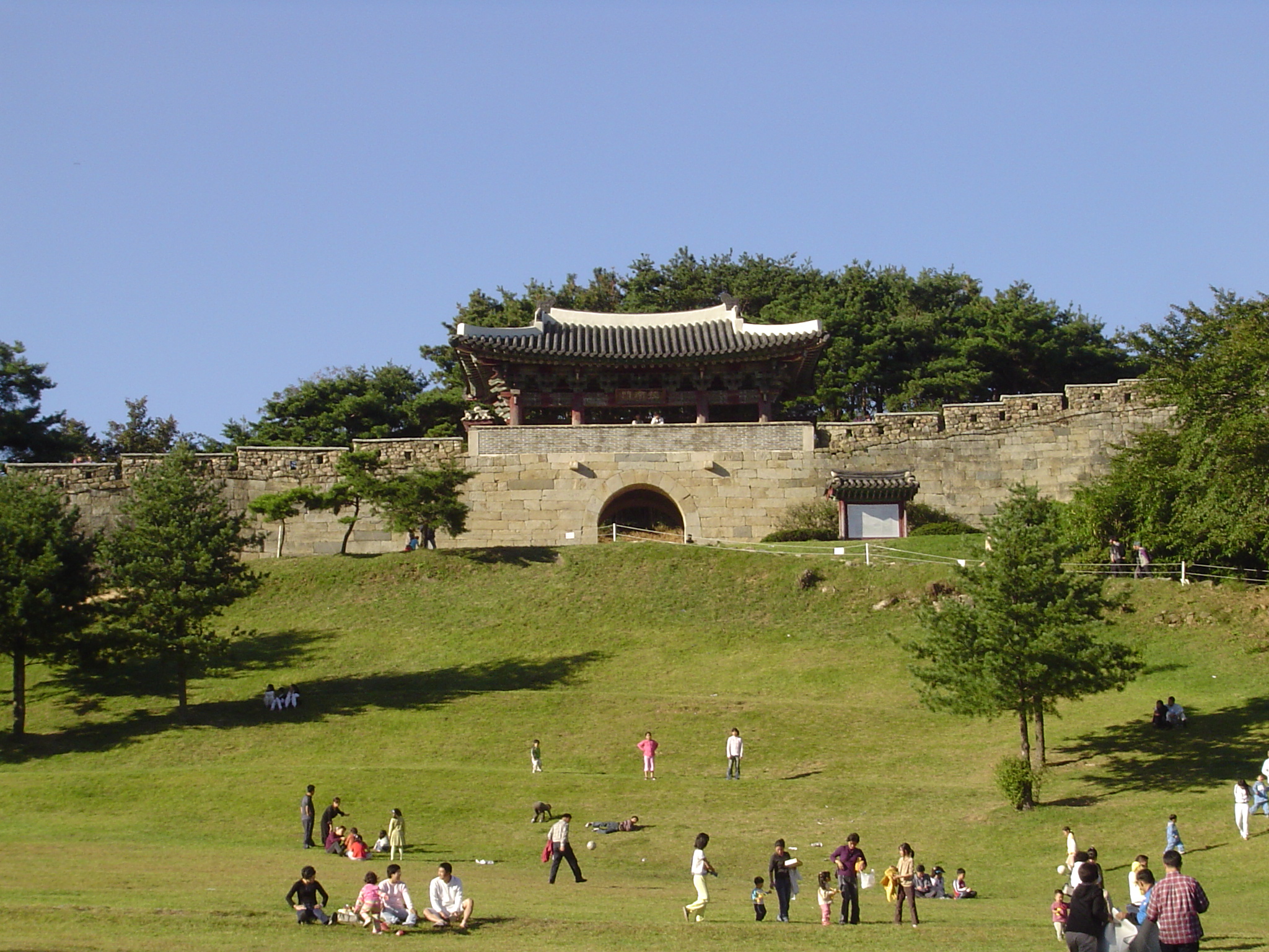 Stone fortress gate and forested hills at Sangdangsanseong, Cheongju