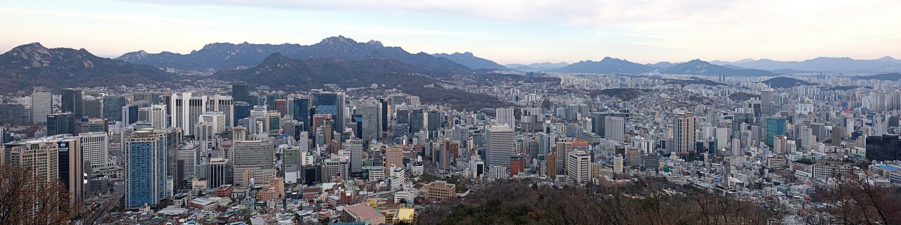 Seoul’s urban panorama and distant mountain ridges, viewed from Namsan